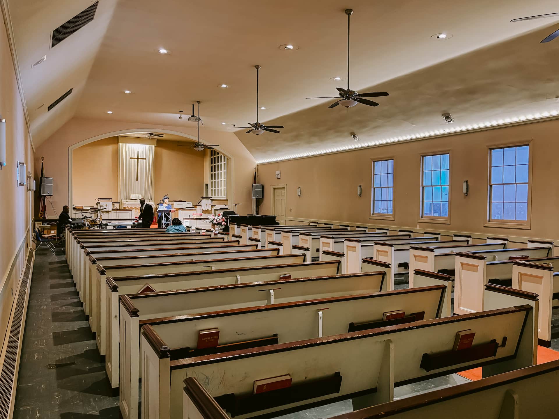 Sanctuary side view with pew seating